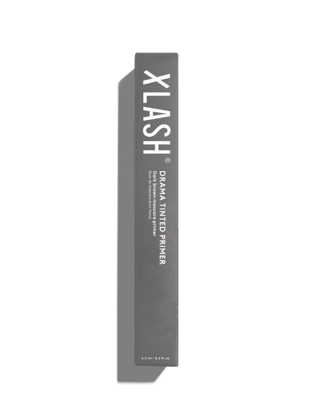 Xlash Drama Tinted Primer -ripsivärinpohjustaja harmaassa pahvi pakkauksessa.